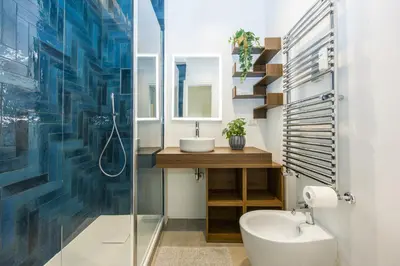 a bathroom with a sink and a toilet and a shower at Paruta Rooms 22 in Rome