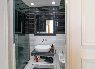 a bathroom with a sink and a mirror at Dreamers in Belsiana Spagna int 8 in Rome