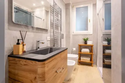 a bathroom with a sink and a toilet at MyRentalInn Scarlatti Rhome Parioli in Rome