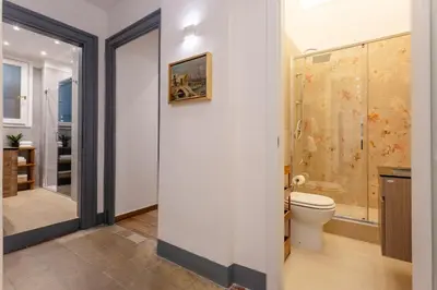 a bathroom with a toilet and a shower at MyRentalInn Scarlatti Rhome Parioli in Rome