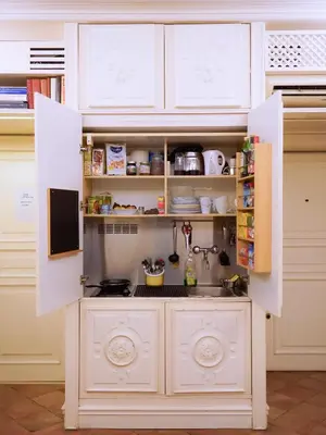 a kitchen with white cabinets and a sink at Best Location in Rome -Historical Center in Rome