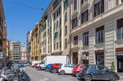 a bunch of cars parked on a city street at Flaminio Tiepolo bright and central in Rome in Rome