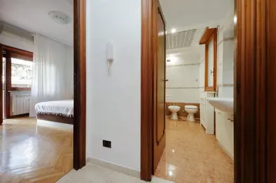 a bathroom with a sink and a toilet in a room at Fossato Di Vico in Rome