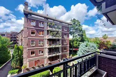 an apartment building with balconies on a balcony at Fossato Di Vico in Rome