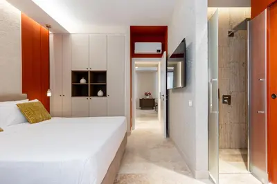 a living room with a couch and a table at Petra Apartments San Giovanni in Rome