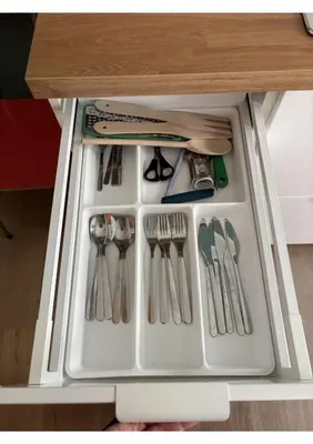 a drawer in a cabinet filled with utensils at Bonci Rooms - Appartamento in zona Policlinico Gemelli, Università Cattolica, Vaticano, Stadio Olimpico in Rome