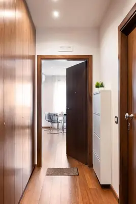 an open door to a dining room with a table at Vatican Loft - Mura Vaticane in Rome