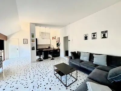 a living room with a couch and a table at Casa Conce two metro stops from the colosseum in Rome
