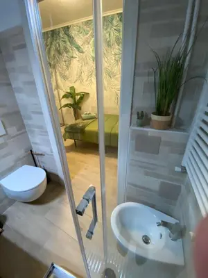 a bathroom with a sink and a toilet at Gentile RHome Apartment, casa vacanze in Rome