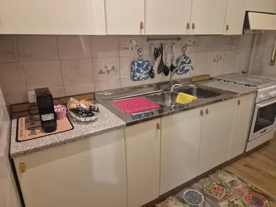 a kitchen with a sink and a counter top at La casetta di Laura al Gemelli-Vaticano in Rome