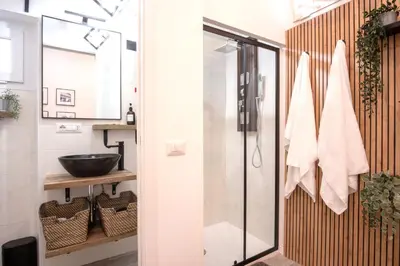 a bathroom with a shower and a sink at Bianca Guest House in Rome