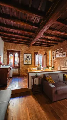 a living room with a couch and a table at Pantheon Private Apartment in Rome