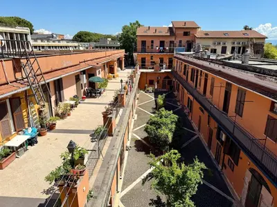 an overhead view of a city street with buildings at SanLo Nest in Rome