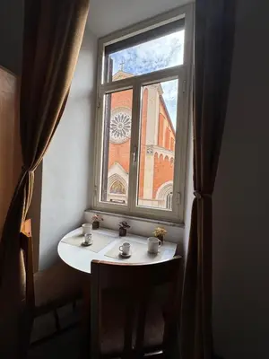 a window with a table in front of a building at Casa Amorello - Vaticano in Rome