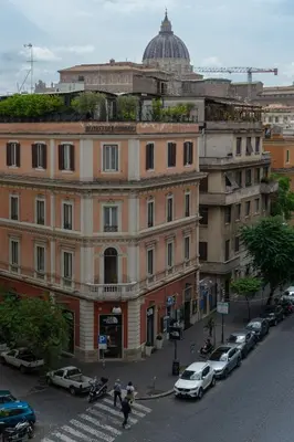 a view of a city street with cars and buildings at Gv Suite Collection - San Pietro Dome in Rome