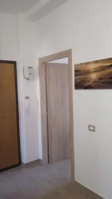 an open door in a room with a doorframe at Danielas House in Rome