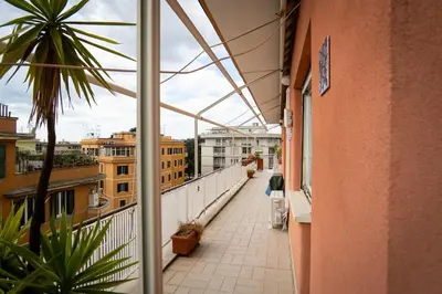 a view of a balcony from a building at Happio Apartment in Rome in Rome