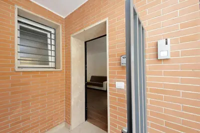 a hallway with a brick wall and a window at Sabelli 3 Villa Indipendente con Studio Privato in Rome