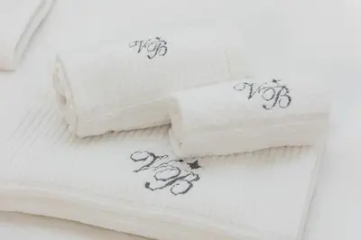 a group of towels with drawings on them at Vicolo Trevi Apartment by Rental in Rome in Rome