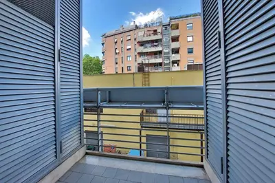 a view of a building from a balcony at 4BNB - Porta Portese Cozy Apartment in Rome