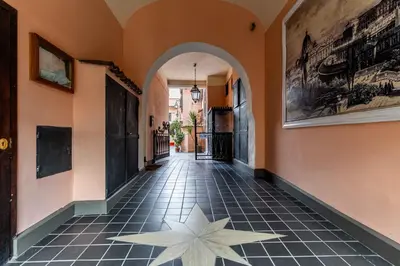 a hallway with a star on the floor at Domus Sabelli in Rome