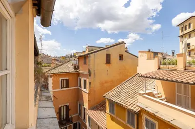 a view of an alley between buildings at Piazza Navona Rooftop Retreat S in Rome