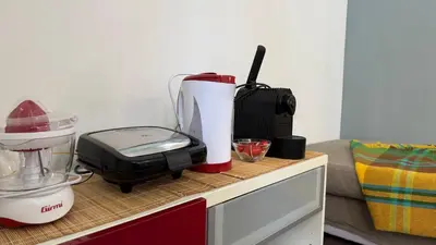 a kitchen counter with a blender on top of it at Oasi Majorana in Rome