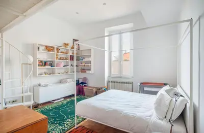 a bedroom with a bed with a glass canopy at Urban Terrace Merulana - by OpenRoma in Rome