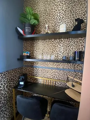 a room with a desk and some shelves at One of one Experiences - LOVE SPA SUITE in Rome