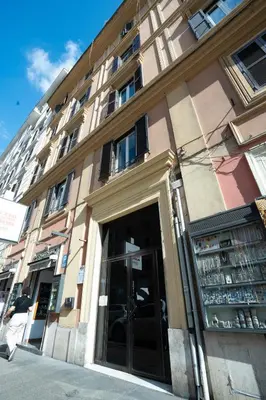 a building with a door in front of it at 101 Flats Candia's Suites in Rome