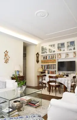 a living room with a glass coffee table at Home in Parioli in Rome