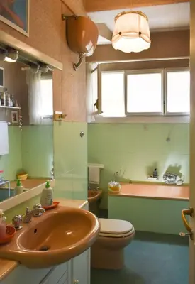 a bathroom with a sink and a toilet at Home in Parioli in Rome