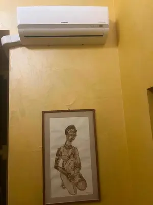 a picture of a drawing of a baseball player on a wall at Antico Suites Roma in Rome