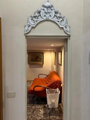 a doorway with a bed in a room at Casa Betania in Rome