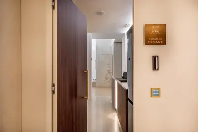 a hallway with a door leading to a bathroom at Borghese Boutique in Rome