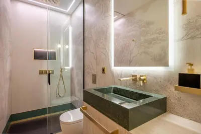 a bathroom with a green sink and a toilet at Borghese Boutique in Rome