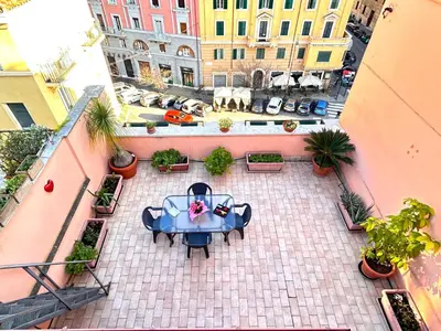 an overhead view of a patio with a table in a courtyard at DomusVaticano in Rome