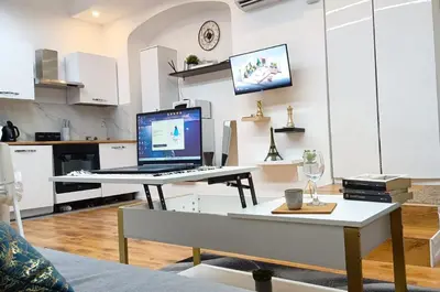 a laptop computer sitting on a desk in a room at Monolocale Stadio olimpico Francia Suite in Rome