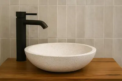 a white sink and a faucet in a bathroom at NERI Vatican Suite in Rome