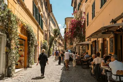 a group of people walking down a street with buildings at Casa Verde - Luxury apartment in Trastevere in Rome
