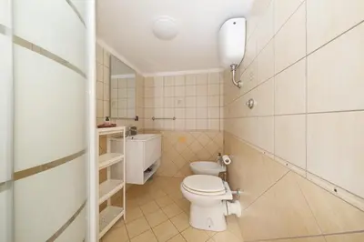 a small bathroom with a toilet and a sink at Duplex Chic in zona trendy in Rome