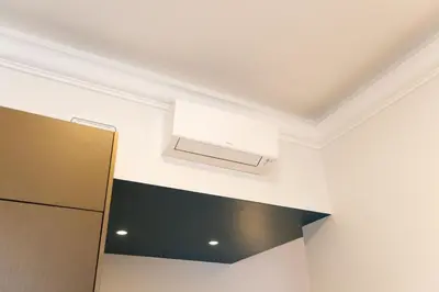 a kitchen with a air conditioner on the ceiling at Casa Lilla in Rome