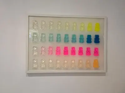 a display case filled with different colored glass figurines at Casa Vacanze Villa Barberina in Rome