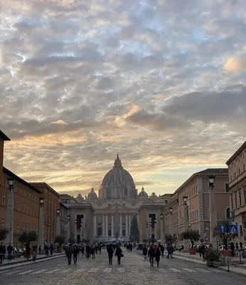 a ceiling of a building with paintings on it at Vatican Apartaments Holiday in Roma in Rome