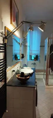 a bathroom with a sink and a bath tub at Casa Alessia a Roma in Rome