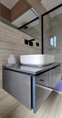 a bathroom with a white sink and a mirror at Elegante Stanza Privata in Centro a Roma Colosseo - FLC Room in Rome in Rome