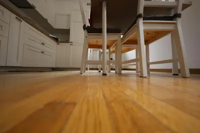 a kitchen with a wooden table and chairs at P-House in Rome