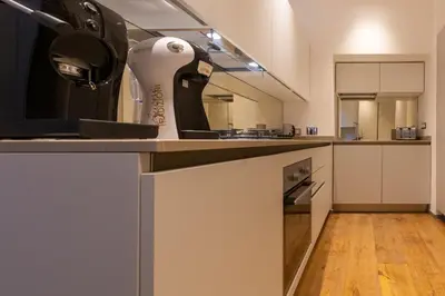 a kitchen with a sink and a counter top at Fontana di Trevi Roma Luxury in Rome