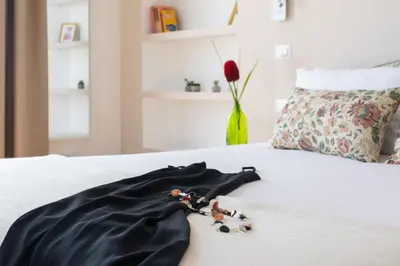 a group of toy figurines on a bed at iFlat La Dolce Vita - Contemporary Luxury in Rome in Rome