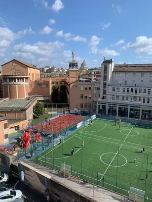 a soccer field in the middle of a city at St Peter view House Vatican in Rome